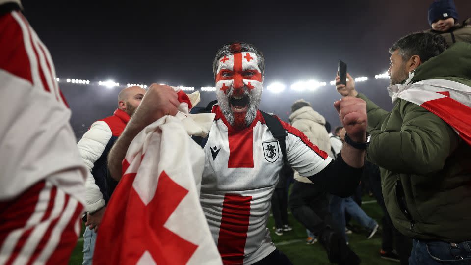 Georgia's fans invaded the pitch after the penalty shootout win. - Giorgi Arjevanidze/AFP/Getty Images