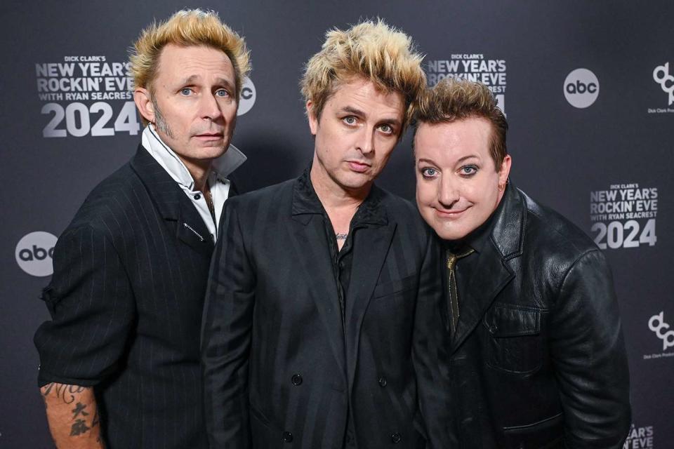 <p>Gilbert Flores/Penske Media via Getty</p> Mike Dirnt, Billie Joe Armstrong and Tre Cool of Green Day in Hollywood in December 2023