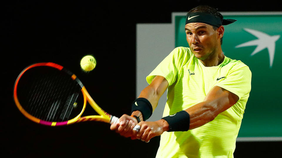 Rafael Nadal is seen here hitting a backhand during an Italian Open victory.