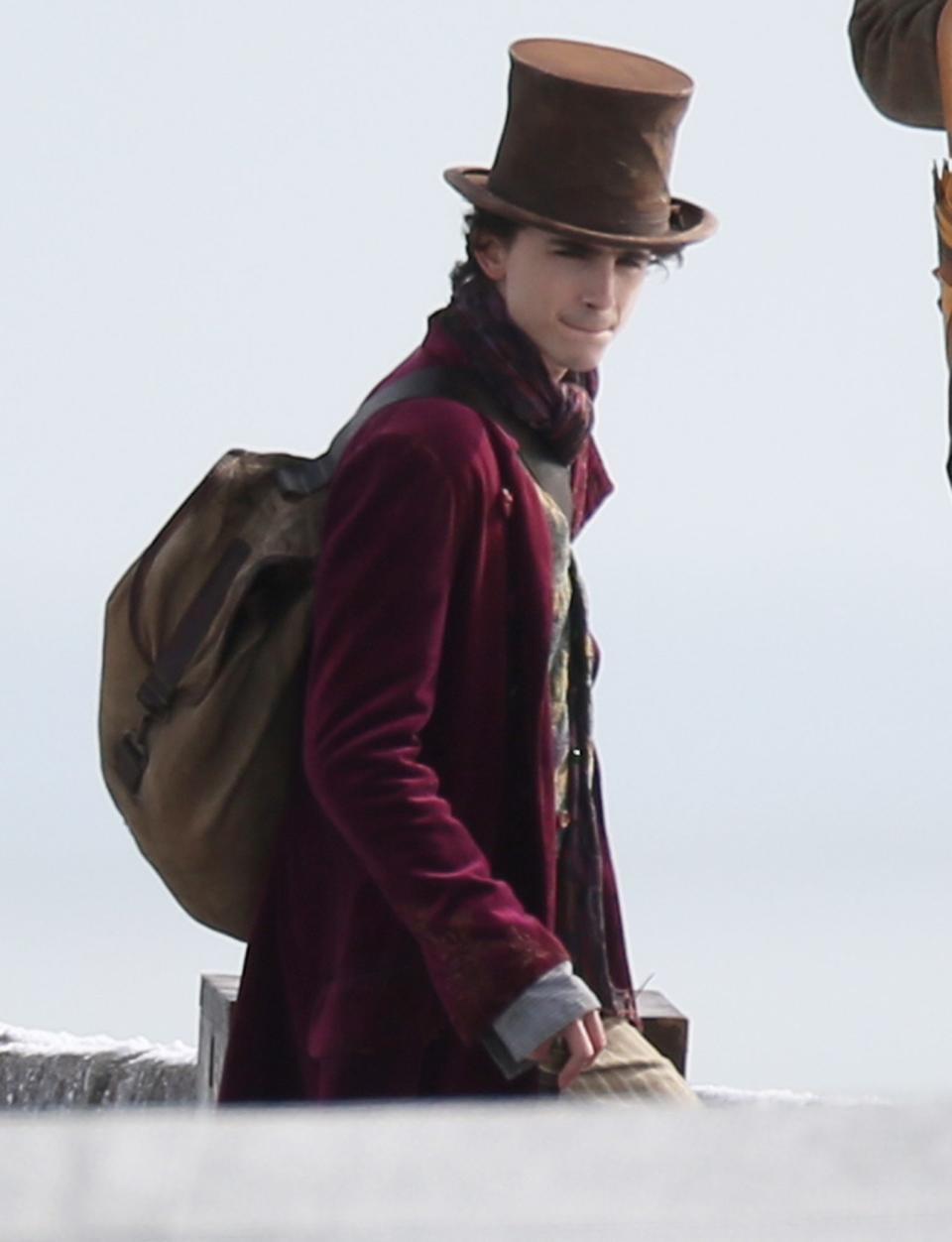 <p>Timothée Chalamet transforms into his character on the set of <em>Wonka</em> in Lyme Regis in Dorset, U.K. on Oct. 11.</p>