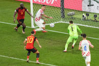 Belgium's Romelu Lukaku (9) and teammate Eden Hazard (10) attack as Croatia's Dejan Lovren (6), goalkeeper Dominik Livakovic (1) and Ivan Perisic (4) defend during the World Cup group F soccer match between Croatia and Belgium at the Ahmad Bin Ali Stadium in Al Rayyan, Qatar, Thursday, Dec. 1, 2022. (AP Photo/Ebrahim Noroozi)