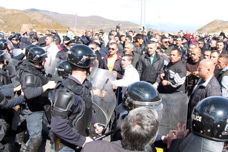 Protestors clash with police during a protest on the Durres-Kukes highway in Kalimash near Kukes, Albania, March 31, 2018. REUTERS/Stringer