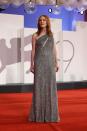 <p>Julianne Moore is wearing Celine by Hedi Slimane: a fully embroidered asymmetrical draped silver couture dress.</p>