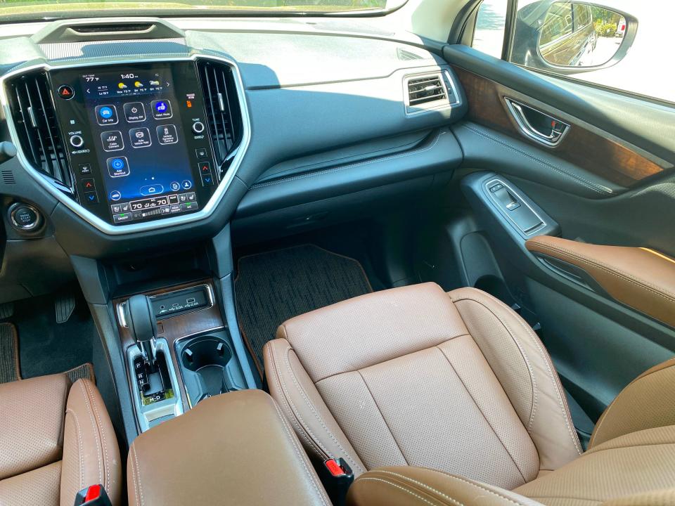 The Java brown leather front passenger seat of a 2024 Subaru Ascent Touring.