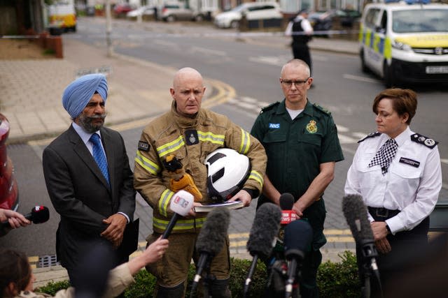 Representatives of the emergency services including Metropolitan Police Assistant Commissioner Louisa Rolfe, speaking in Hainault, north east London.