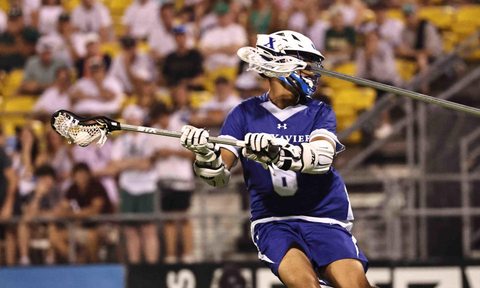 St. Xavier's  Khalif Hocker tries to score during the state championship lacrosse game against Dublin Jerome at Crew Stadium Saturday, June 3, 2023.