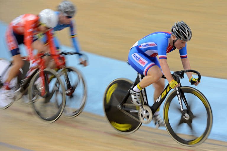 Czech Republic's Jarmila Machacova (R) competes to win the gold medal in UCI Track Cycling World Championships Women's 25 km Point Race in Belarus' capital of Minsk on February 23, 2013