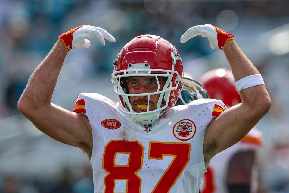 Kansas City Chiefs tight end Travis Kelce (87) encourages fans in the stands during the last moments of an NFL football game against the Jacksonville Jaguars on Sunday, Sept. 17, 2023, in Jacksonville, Florida. The Chiefs defeated the Jaguars 17-9.