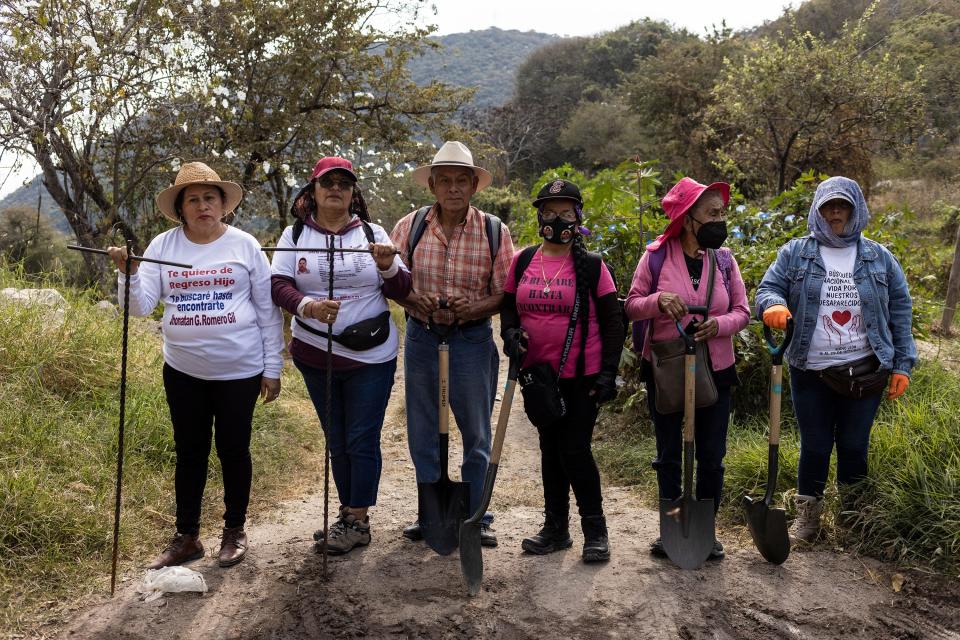 Members of the VII National Search Brigade for Disappeared Persons search an area in Loma Bonita on the outskirts of Cuernavaca, Morelos.