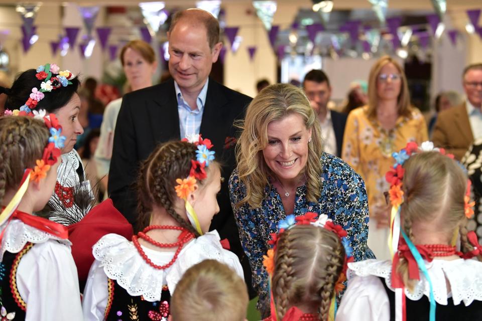 Prince Edward, Earl of Wessex and Sophie, Countess of Wessex meet local children during the Queen's Platinum Jubilee celebration in Belfast, Northern Ireland (REUTERS)