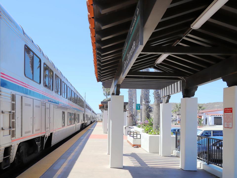 Amtrak Pacific Surfliner train passing through San Clemente Train Station