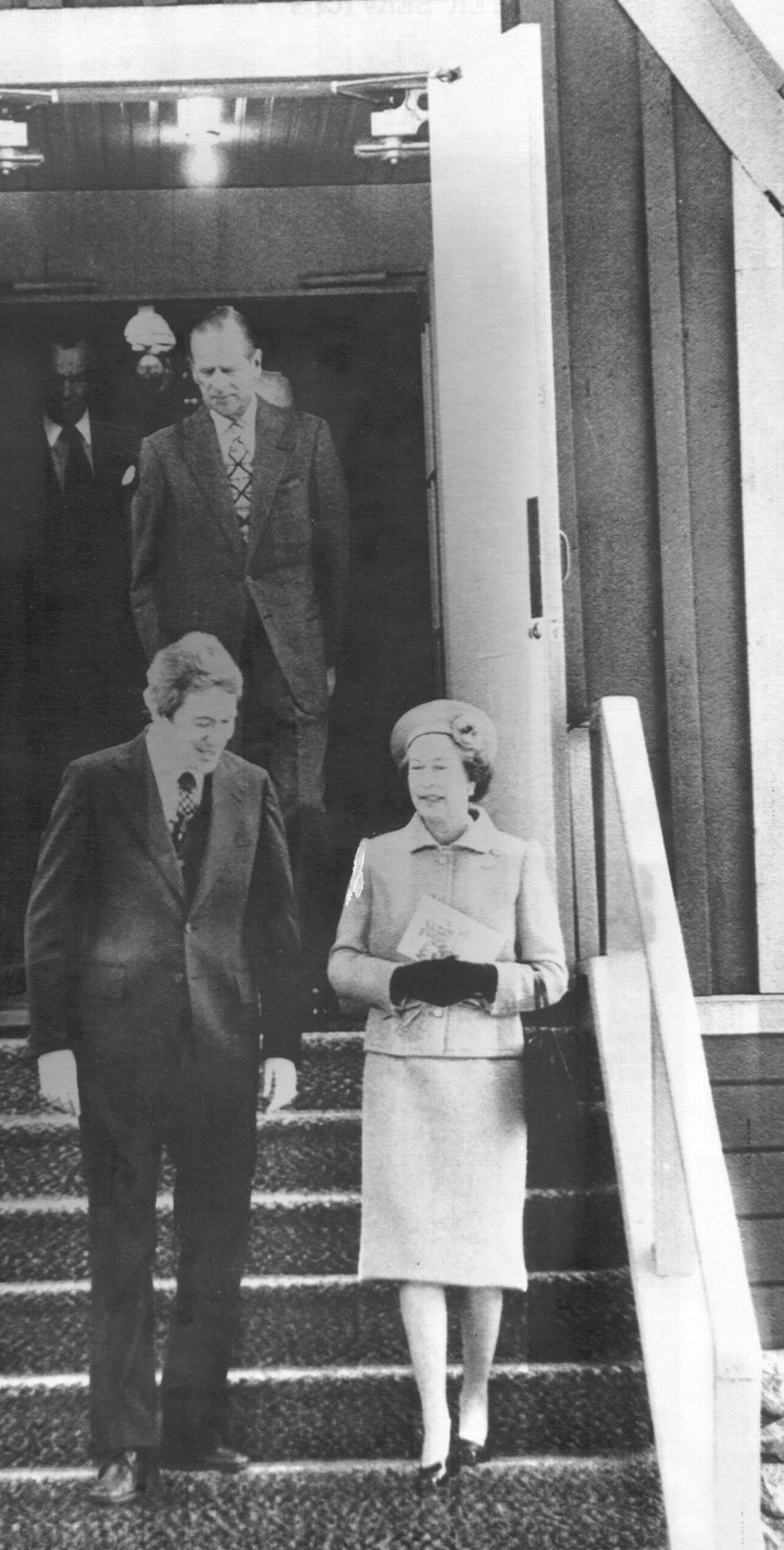 Queen Elizabeth II leaves the chapel with the Rev. John C. Davis after services during her 1983 visit to Yosemite National Park. Fresno Bee archive