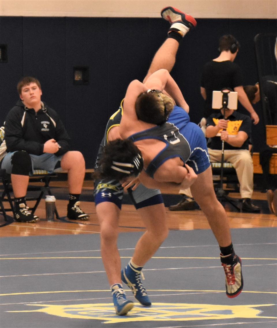 Central Valley Academy's Cooper Reed throws Camden Blue Devil Joseph Golombek to the mat during Wednesday's dual meet in Ilion. Reeds pinned his opponent in the first period that day, and Camden returns to town Tuesday for the Section III's Division II dual meet tournament.
