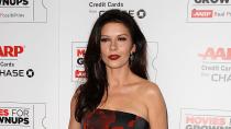 <p> We're obsessed with dark red lipstick for a chic and sultry date night or evening look. As Catherine Zeta-Jones proves, the rich colour is perfect for pairing with a darker eye look, whether that's a winged liner or a smoky eye. For the rest of her makeup, she's kept very glowy and fresh, which is a good tip for anyone looking to try this merlot-like hue. </p>