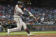 Arizona Diamondbacks' Carson Kelly hits a home run against the San Francisco Giants during the sixth inning of a baseball game in San Francisco, Monday, June 14, 2021. (AP Photo/Jeff Chiu)