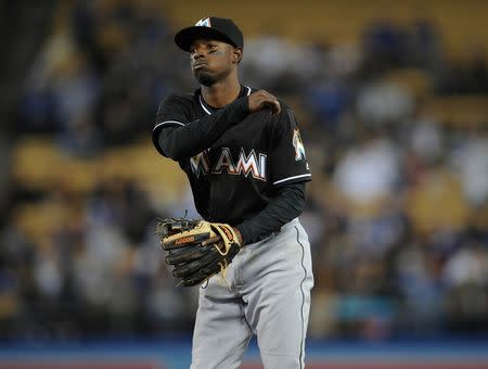 April 28, 2016; Los Angeles, CA, USA; Miami Marlins second baseman Dee Gordon (9) against the Los Angeles Dodgers at Dodger Stadium. Mandatory Credit: Gary A. Vasquez-USA TODAY Sports