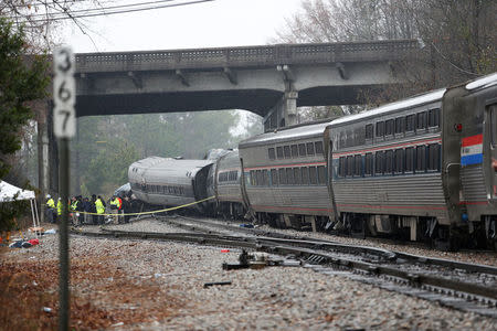 Emergency responders are at the scene after an Amtrak passenger train collided with a freight train and derailed in Cayce, South Carolina, U.S., February 4, 2018. REUTERS/Randall Hill