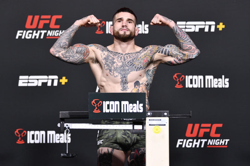 LAS VEGAS, NEVADA - NOVEMBER 19: Sean Brady poses on the scale during the UFC Fight Night weigh-in at UFC APEX on November 19, 2021 in Las Vegas, Nevada. (Photo by Chris Unger/Zuffa LLC)