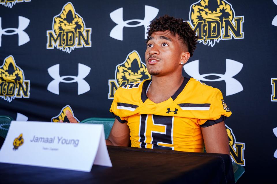 Marcos De Niza's captain, Jamaal Young, speaks to a reporter during Tempe Union School District's Football Media Day at Valle Luna Mexican Restaurant on Aug. 6, 2022, in Chandler, AZ.