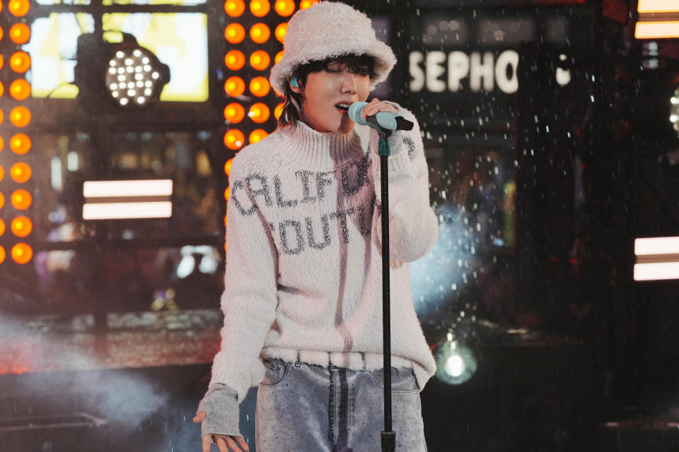 J-Hope performs onstage in Times Square during the first New Year's Eve event without restrictions since the coronavirus disease (COVID-19) pandemic in the Manhattan borough of New York City, New York, U.S., December 31, 2022. REUTERS/Jeenah Moon