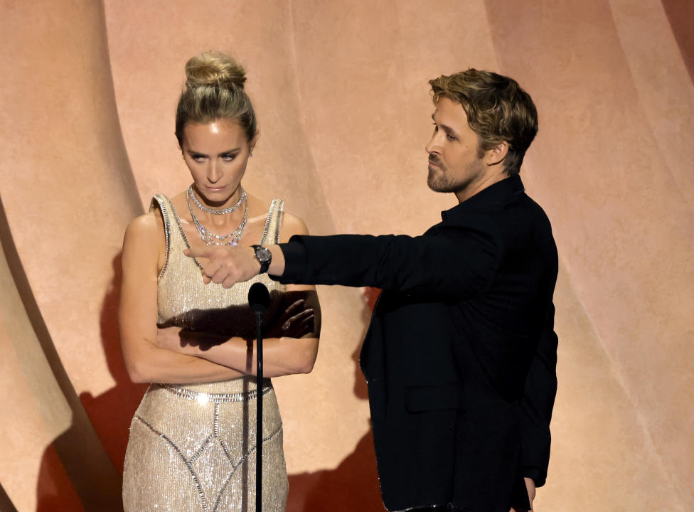 HOLLYWOOD, CALIFORNIA - MARCH 10: (L-R) Emily Blunt and Ryan Gosling speak onstage during the 96th Annual Academy Awards at Dolby Theatre on March 10, 2024 in Hollywood, California. (Photo by Kevin Winter/Getty Images)