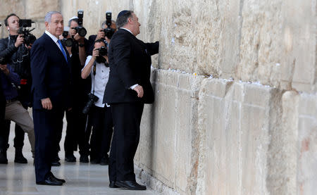 U.S. Secretary of State Mike Pompeo is accompanied by Israeli Prime Minister Benjamin Netanyahu during his visit it to the Western Wall in Jerusalem's Old City March 21, 2019. Abir Sultan/Pool via REUTERS