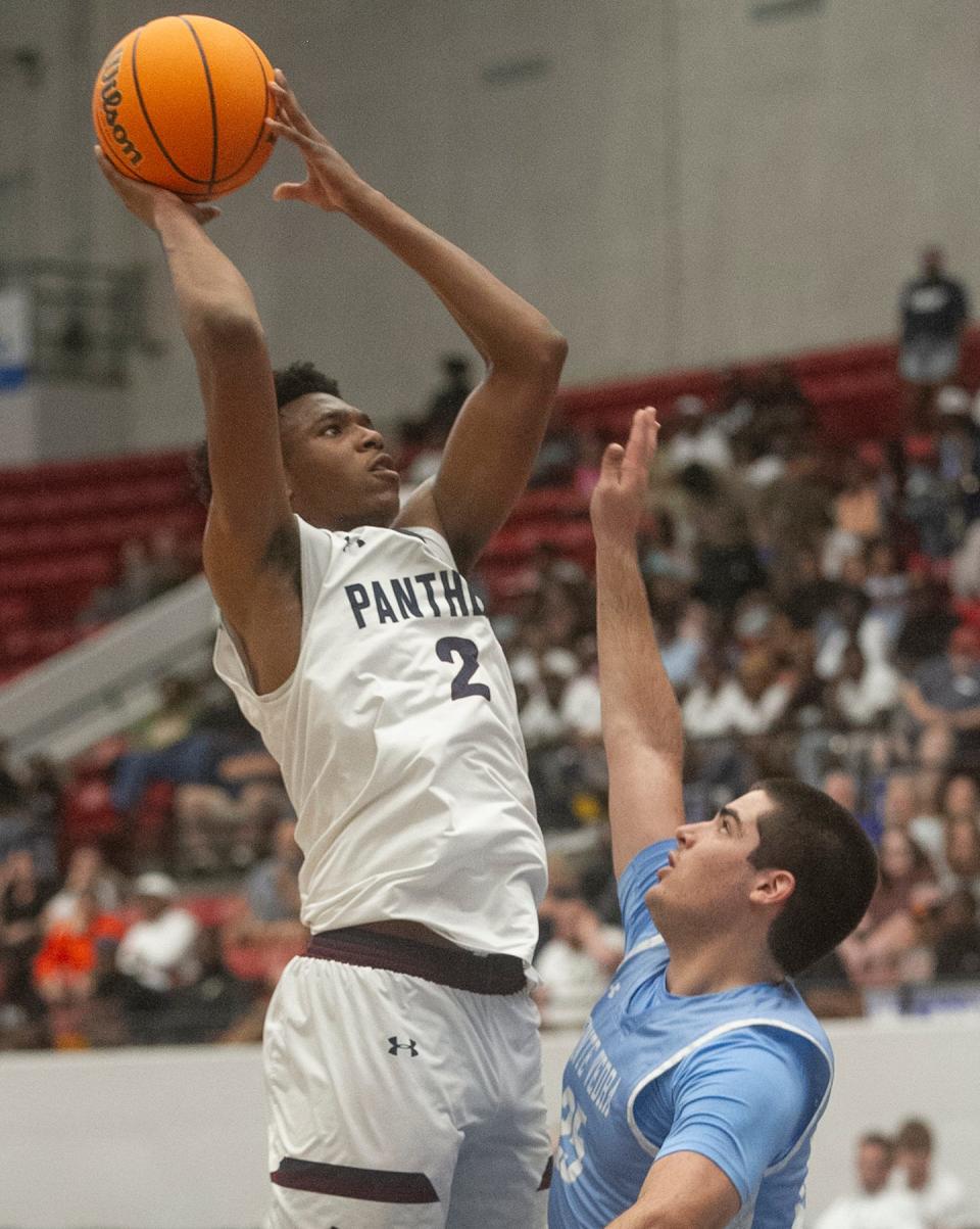Dwyer's Amari Nealy (2) goes up for a basket against Ponte Vedra during their FHSAA Boys 6A Championship basketball game at The RP Funding Center in Lakeland Saturday. March 4, 2023.