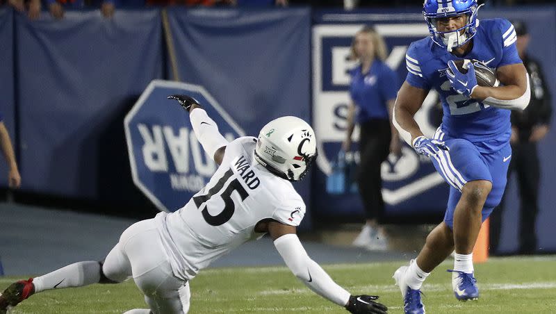 BYU running back LJ Martin looks for an opening against Cincinnati at LaVell Edwards Stadium in Provo on Friday, Sept. 29, 2023. The Texas native will return to the Lone Star State Saturday to play TCU in Fort Worth.