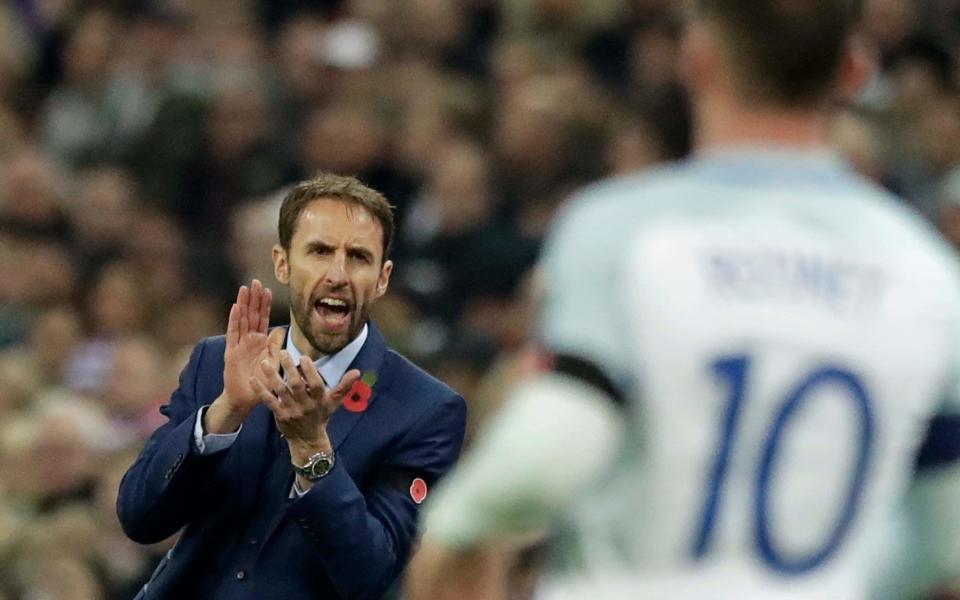 Gareth Southgate has left Wayne Rooney out of England's squad for their upcoming games - Credit: AP