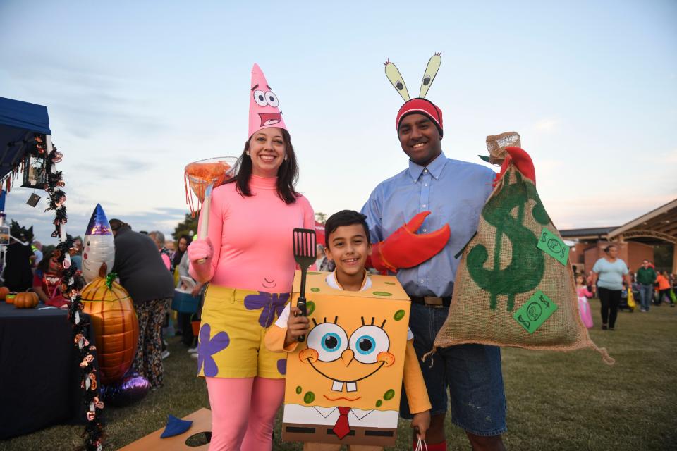 Families turn out to Columbia County Trick-or-Treat in Evans Towne Center Park on Thursday, Oct. 19, 2023.