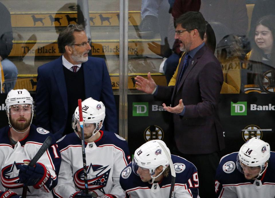 Columbus Blue Jackets head coach John Tortorella talks to assistant Brad Shaw during the first period of Game 5 of the NHL Stanley Cup Playoffs Eastern Conference semifinals at TD Garden in Boston on Saturday, May 4, 2019. [Adam Cairns/Dispatch]