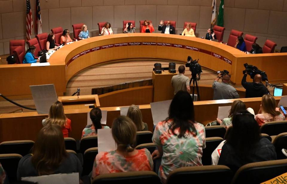 Parents and students listen as members of the Charlotte-Mecklenburg Board of Education vote on an amendment to the south Charlotte boundaries on Tuesday, June 6, 2023.