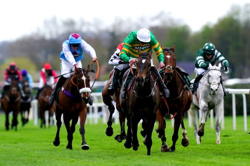 Its On The Line, ridden by jockey Derek O'Connor (centre), on the way to winning the Randox Foxhunters' Open Hunters' Chase on day one of the 2024 Randox Grand National Festival at Aintree Racecourse on Thursday, April 11 2024