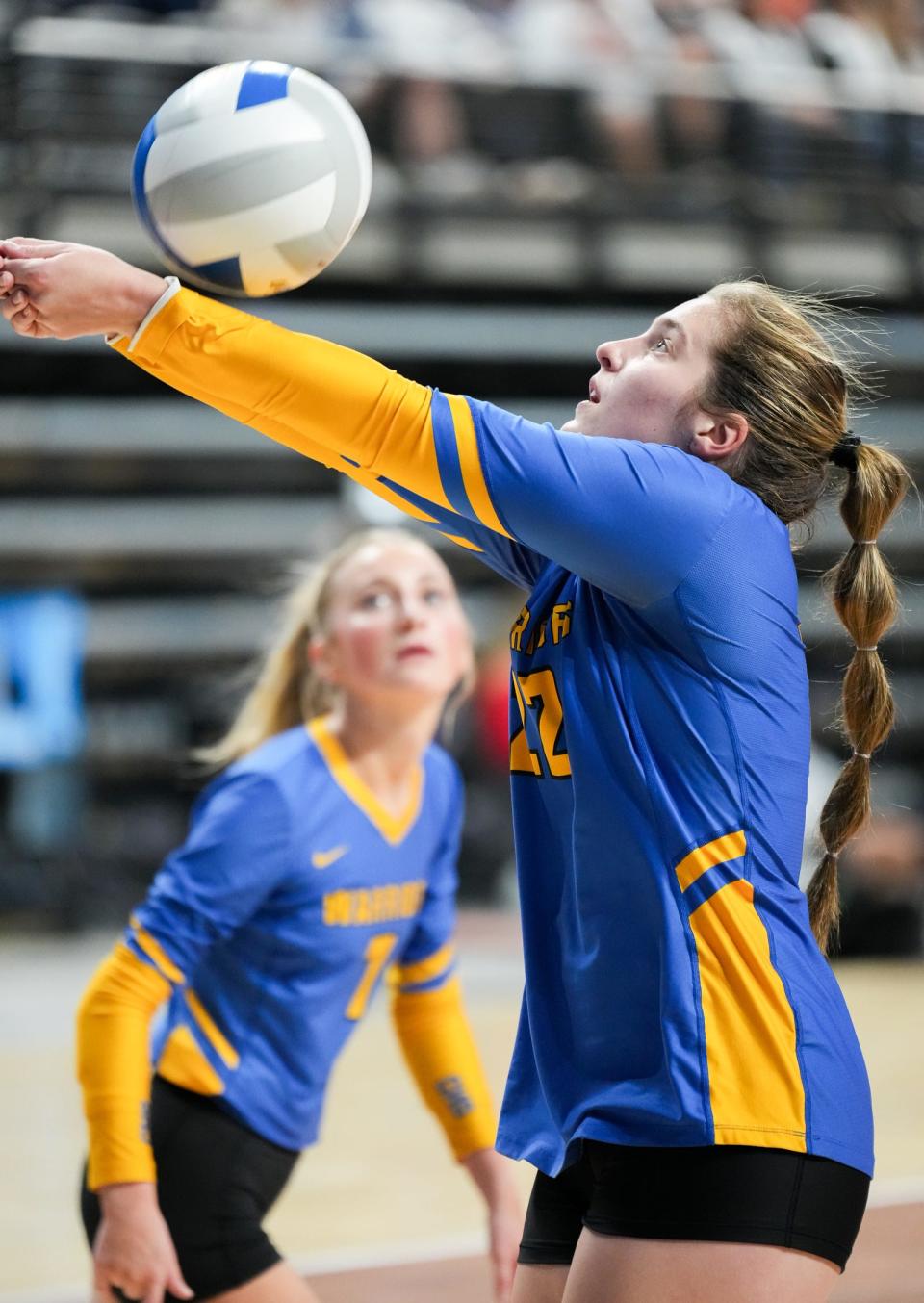 Castlewood's Gracie Haug reaches to keep the ball alive as teammate Cassidy Kirwan watches during a semifinal match against Chester in the state Class B volleyball tournament on Friday, Nov. 17, 2023 in the Summit Arena at The Monument in Rapid City.