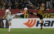 Soccer Football - Europa League - AEK Athens vs AC Milan - OAKA Spiros Louis, Athens, Greece - November 2, 2017 AC Milan's Hakan Calhanoglu in action with AEK Athens' Ognjen Vranjes REUTERS/Costas Baltas