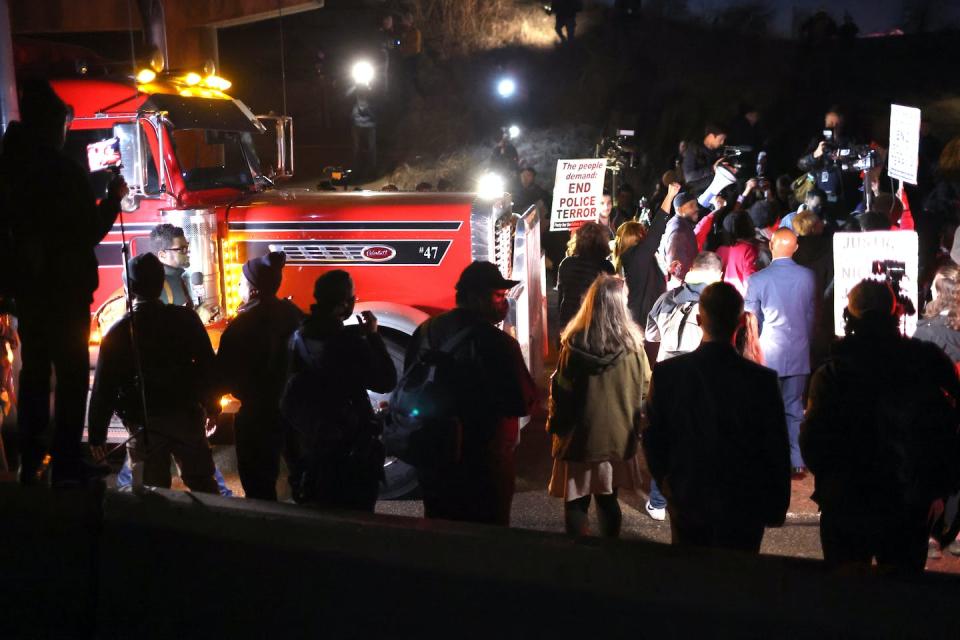 Demonstrators block traffic in Memphis after police released video footage depicting the fatal beating of Tyre Nichols. <a href="https://www.gettyimages.com/detail/news-photo/demonstrators-block-traffic-protesting-the-death-of-tyre-news-photo/1460145824?adppopup=true" rel="nofollow noopener" target="_blank" data-ylk="slk:Scott Olson/Getty Images News via Getty Images;elm:context_link;itc:0;sec:content-canvas" class="link ">Scott Olson/Getty Images News via Getty Images</a>