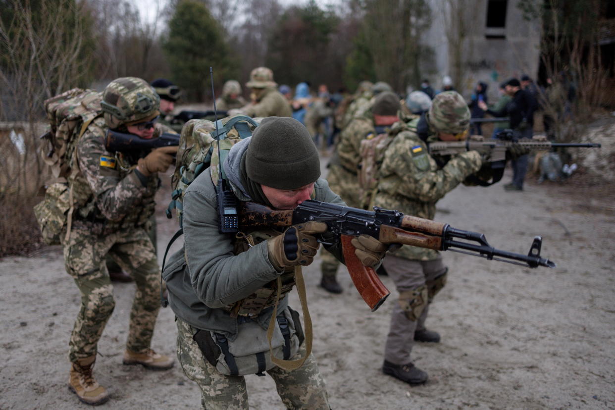 Reservists take part in a tactical training and individual combat skills conducted by the Territorial Defense of the Capital in Kyiv.