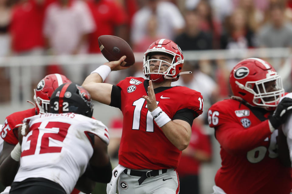 Georgia quarterback Jake Fromm (11) throws from the pocket in the first half of an NCAA college football game against Arkansas State Saturday, Sept. 14, 2019, in Athens, Ga. (AP Photo/John Bazemore)