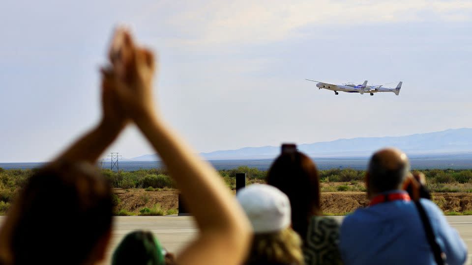 People react as a passenger rocket plane operated by Virgin Galactic lifts off during the company's first commercial flight at the Spaceport America facility in New Mexico on June 29, 2023. - Jose Luis Gonzalez/Reuters
