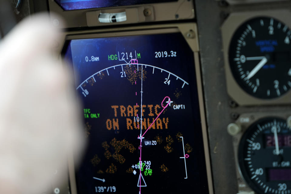 Honeywell test pilot Joe Duval pulls a Boeing 757 test aircraft out of a landing approach demonstrating runway hazard warning systems over the airport in Tyler, Texas, Tuesday, June 4, 2024. (AP Photo/LM Otero)