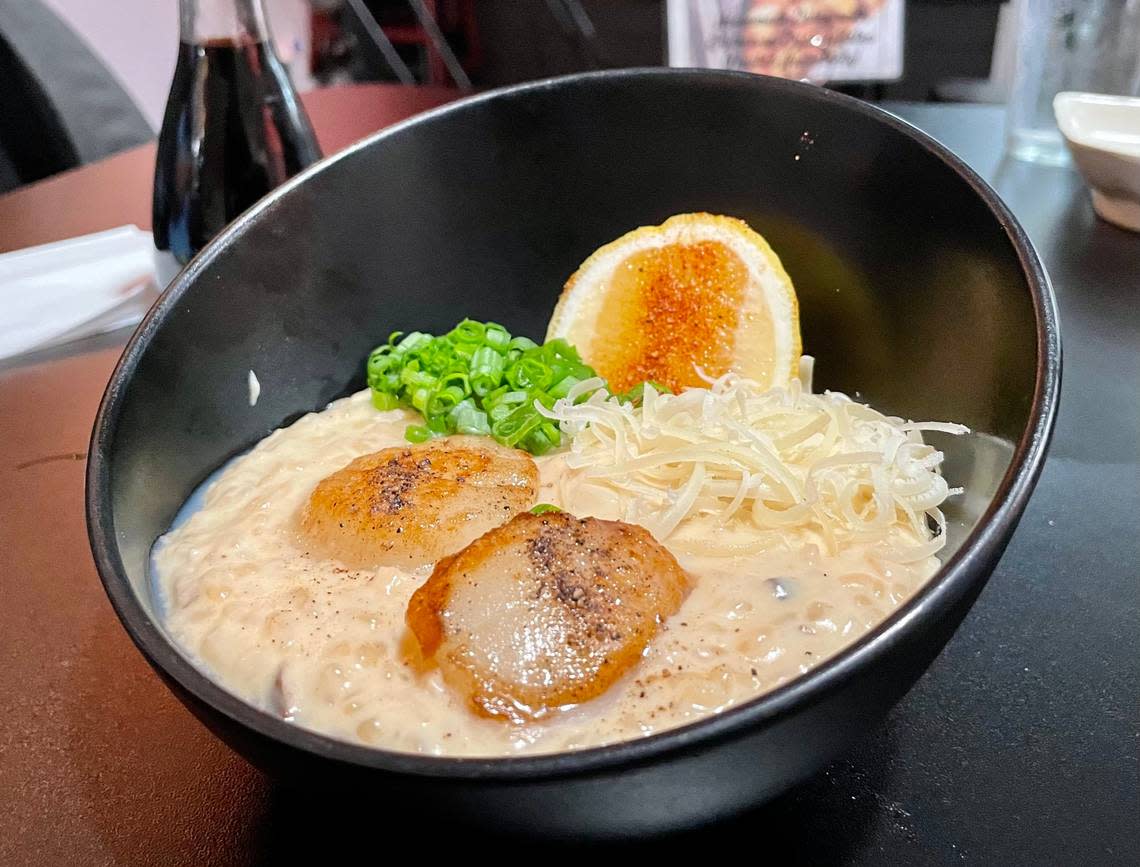 Koi Japanese Bistro’s miso-and-mushroom risotto with pan-seared scallops is both creamy and savory. Benjy Egel/The Sacramento Bee