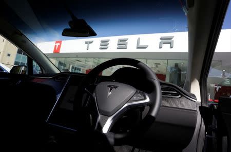 A Tesla Model X car's interior is photographed at a Tesla electric car dealership in Sydney, Australia, May 31, 2017. REUTERS/Jason Reed/Files