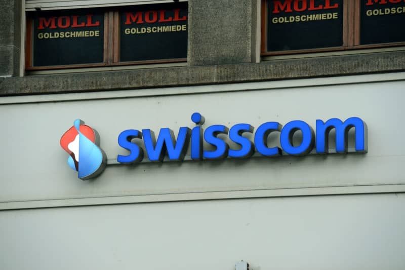The logo of the Swiss telecommunications company Swisscom is pictured in Basel. Patrick Seeger/dpa