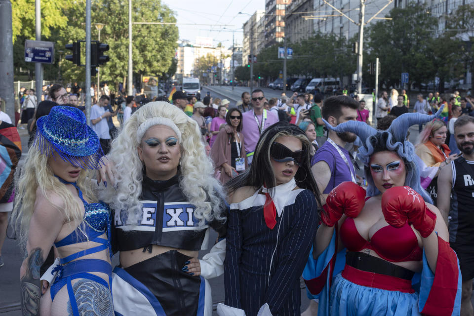 Drag performers are seen as they attend a Pride march in Belgrade, Serbia, Saturday, Sept. 9, 2023. Hundreds of Pride activists gathered in the Serbian capital Saturday amid heavy police presence and anti-gay messages sent by the country's conservative leadership and far rights groups. (AP Photo/Marko Drobnjakovic)