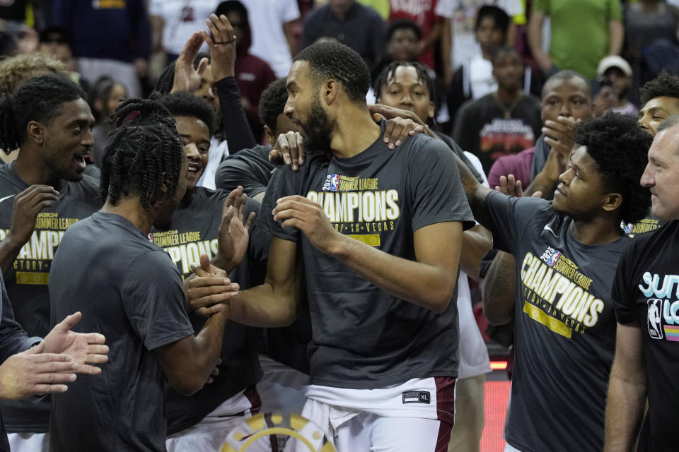 Cleveland Cavaliers' Isaiah Mobley, center, celebrates with teammates after defeating the Houston Rockets in a NBA summer league championship basketball game Monday, July 17, 2023, in Las Vegas. (AP Photo/John Locher)