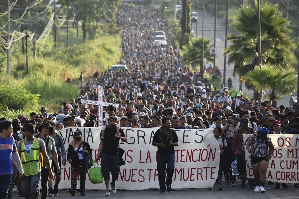 Migrants who had been waiting for temporary transit papers but failed to get them after waiting, some up to two months, leave Tapachula, Mexico, Monday, Oct. 30, 2023, as they make their way to the U.S. border. The migrants said they did not have the resources to pay for more food and lodging as they wait. (AP Photo/Edgar Clemente)