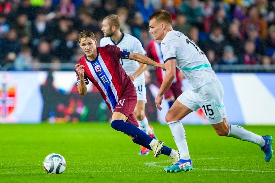 Martin Odegaard in action against Austria (NTB/AFP via Getty Images)