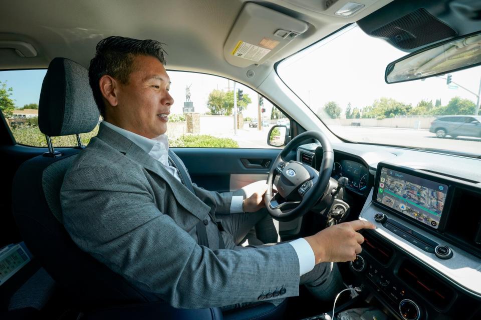 May 29, 2024; Garden Grove, CA, USA; Derek Tran drives through the Little Saigon area of Orange County on his way to meet with community members.