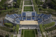 Stands are under construction on the Champ-de-Mars, Sunday, April 14, 2024 in Paris. The Champ-de-Mars will host the Beach Volleyball and Blind Football at the Paris 2024 Olympic and Paralympic Games. (AP Photo/Aurelien Morissard, File)