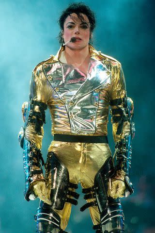 <p>Peter Carrette Archive/Getty</p> Michael Jackson performs live on stage at the Sydney Cricket Ground during his 'HIStory' world concert tour in November 1996 in Sydney